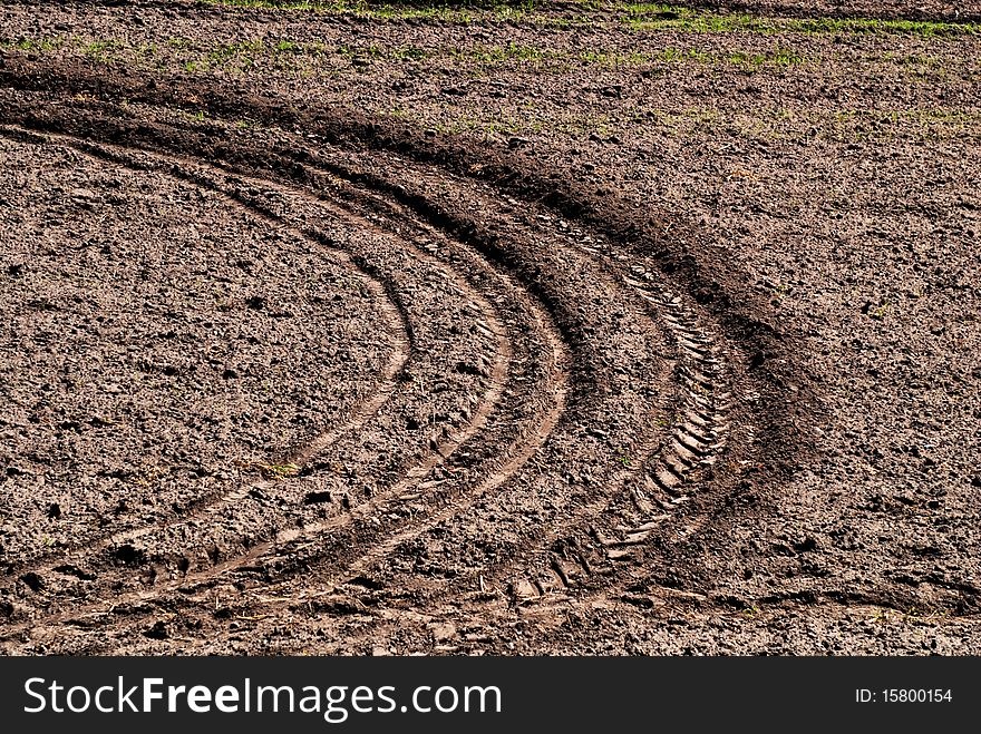 Tire track in a heap of sand