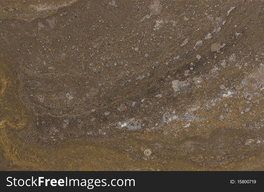 Surface of the travertine. Reddish-brown.