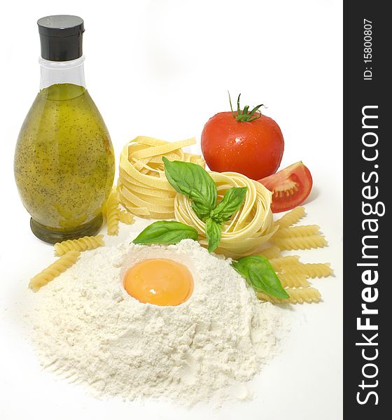 Nice fresh pasta ingredients isolated on white background