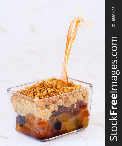 Dried fruit(apricots and raisins) crumble topping with granola and almond. Dried fruit(apricots and raisins) crumble topping with granola and almond