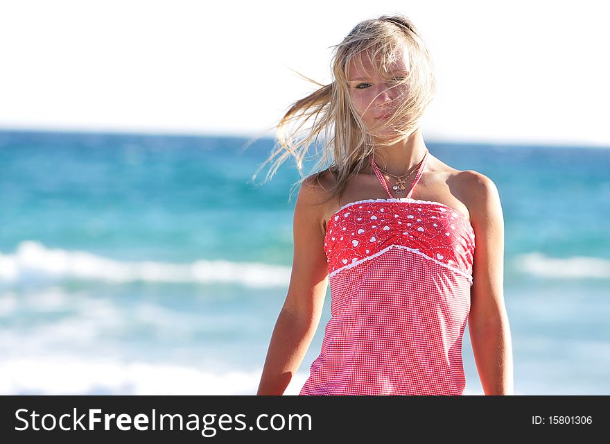 Young girl on sea background