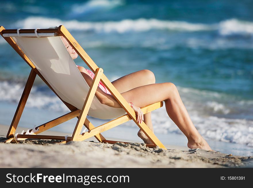 Girl Relaxing On Beach