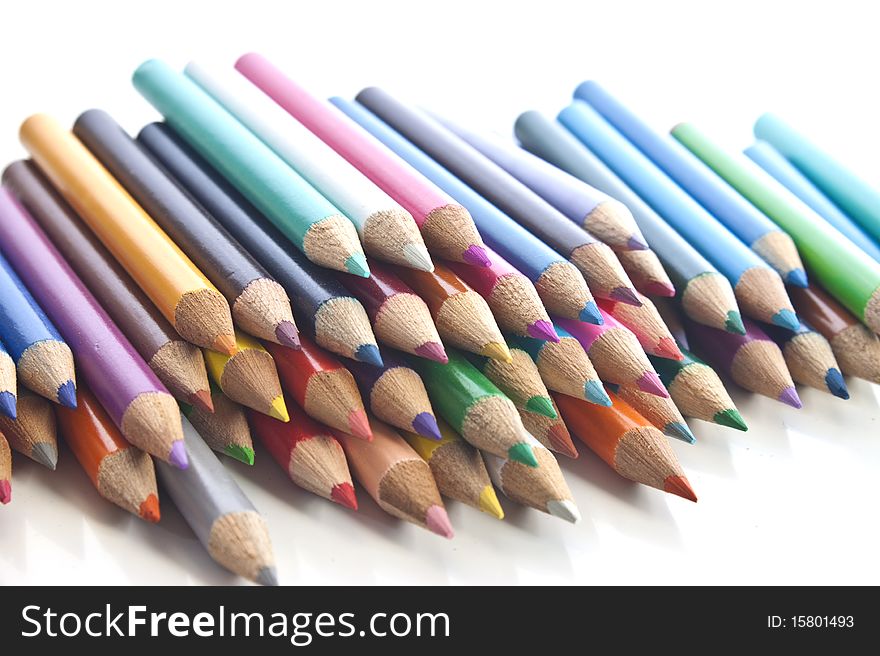 A stack of different coloured pencils. A stack of different coloured pencils
