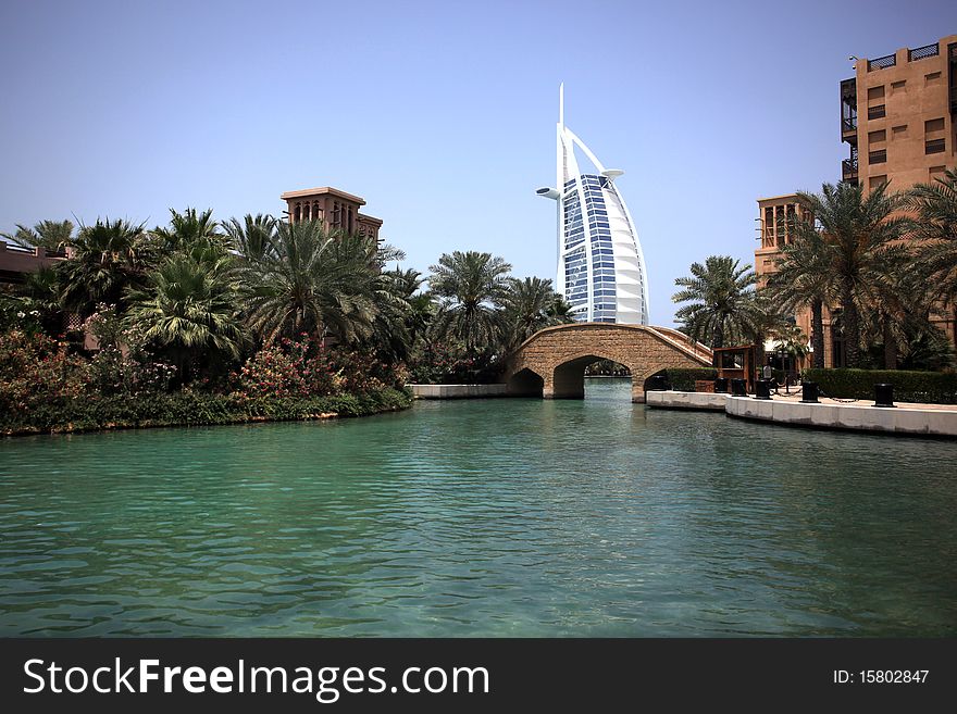 Jumeirah with palmsthe burj al arab (arabian tower) from the madinat with palms