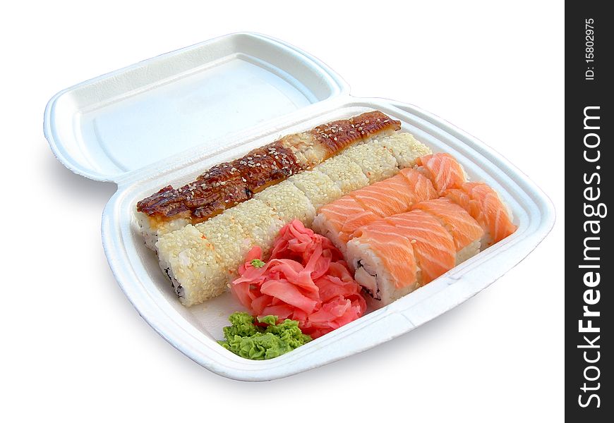 Rolls, ginger and wasabi in a plastic box shown in the picture. Rolls, ginger and wasabi in a plastic box shown in the picture.