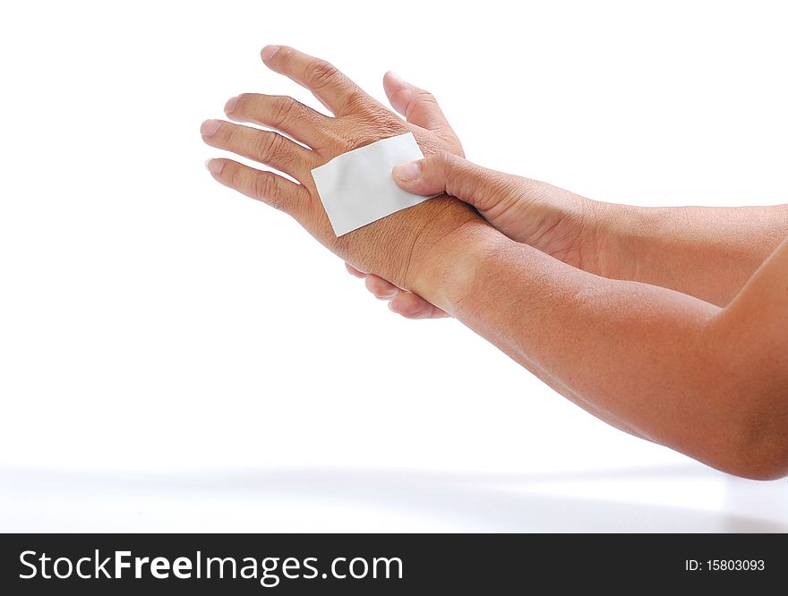 Man hand massages his hand isolated on white