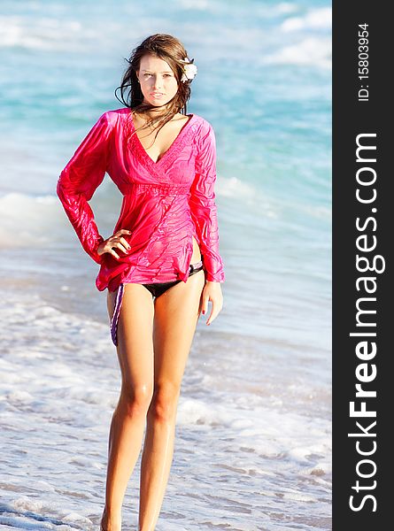 Young beautiful woman on beach