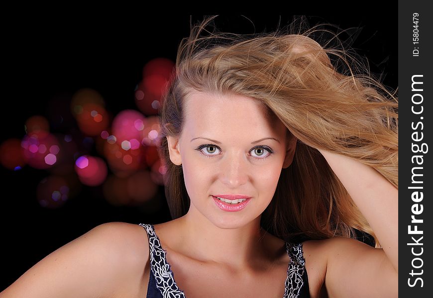 A young girl cheerfully spends time in a disco