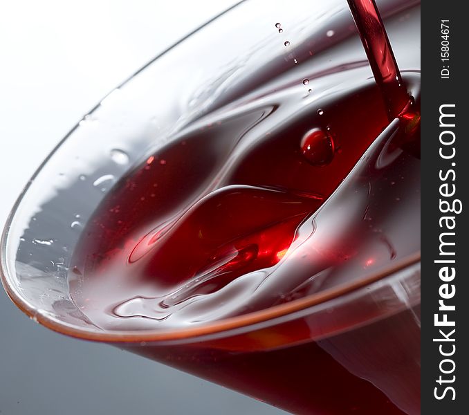 Creative splashing red fresh cocktail