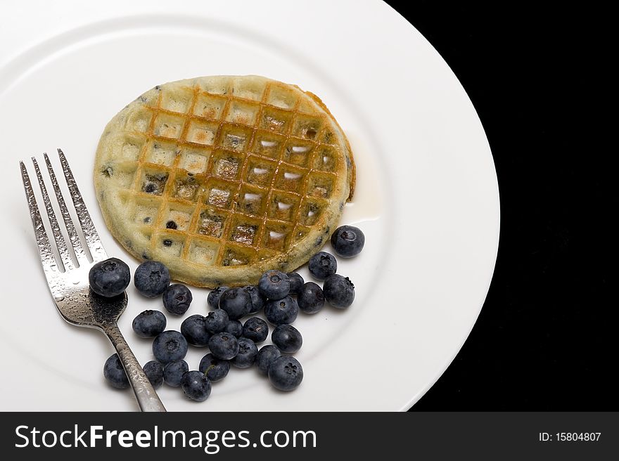 Waffle with sweet fresh blueberries. Waffle with sweet fresh blueberries