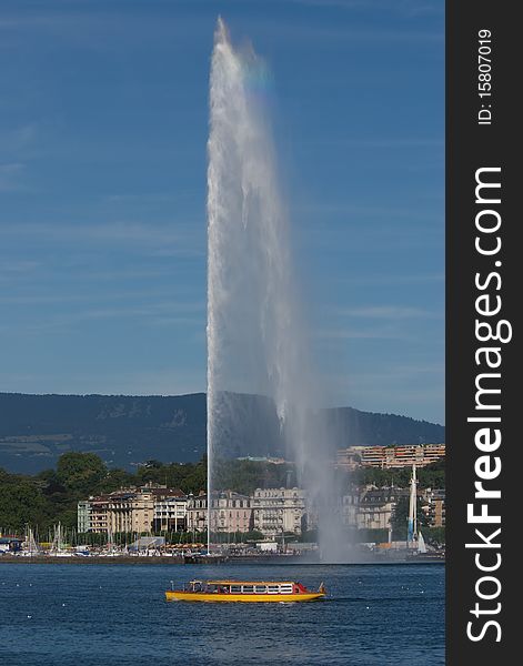 A Ferry in Geneva, Switzerland, crossing Lake Geneva on a beautiful summer day. A Ferry in Geneva, Switzerland, crossing Lake Geneva on a beautiful summer day