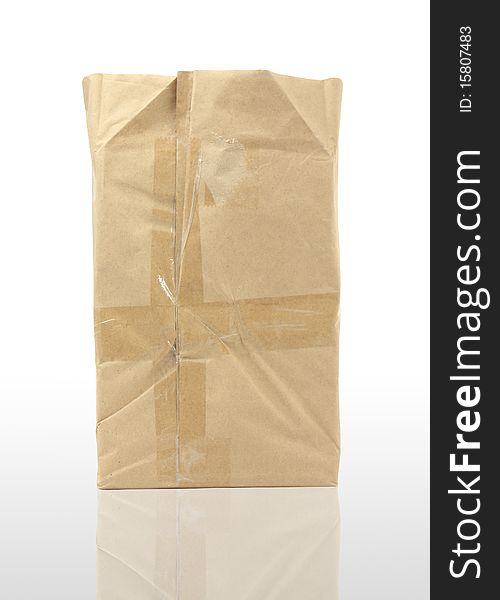 Brown paper bag with handles, isolated on white background. Brown paper bag with handles, isolated on white background