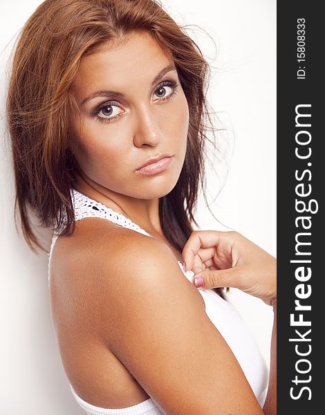 Portrait of a beautiful tanned young woman. Portrait of a beautiful tanned young woman