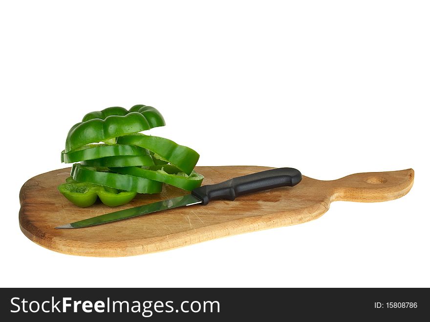 Cutting board with sliced green bell pepper