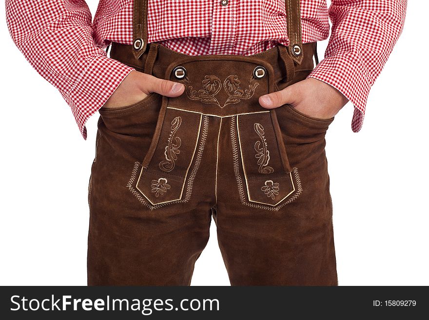 Closeup of a Bavarian man with hands in oktoberfest leather trousers (lederhose) pocket. Closeup of a Bavarian man with hands in oktoberfest leather trousers (lederhose) pocket.