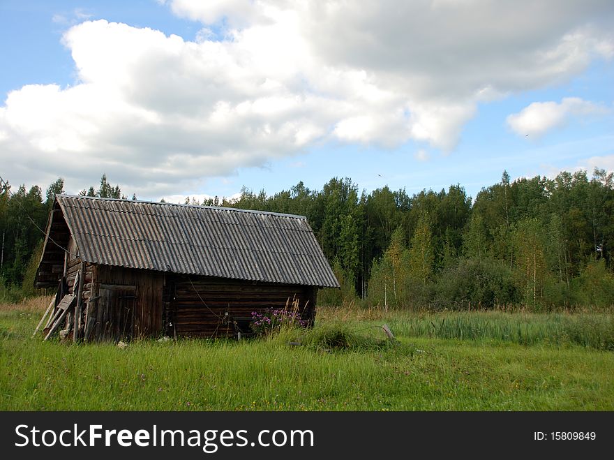 Old wooden hut near the forest. Old wooden hut near the forest