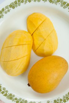 Ripe Golden Mangoes On White Dish Stock Photos