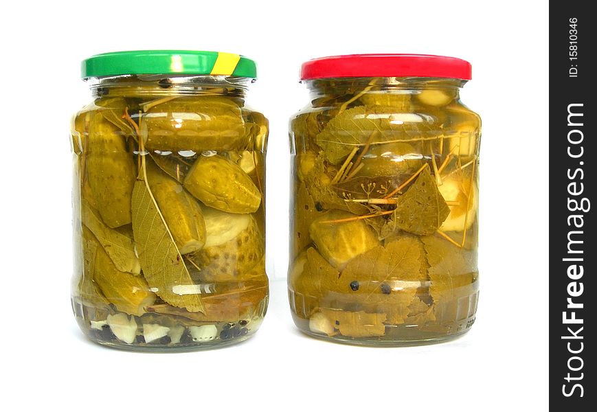 Bank of pickled cucumbers are shown in the picture. Bank of pickled cucumbers are shown in the picture.