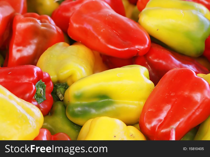 Yellow and redpeppers, good background. Yellow and redpeppers, good background