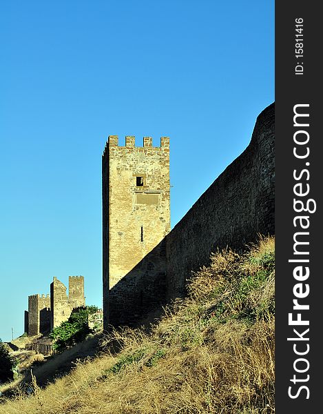 Be single tower of the Genoese fortress of city pike Perch in Ukraine on a background dark blue sky