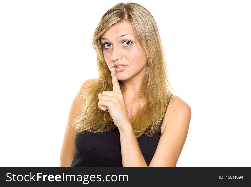 Young Woman Gesturing for Quiet or Shushing. Isolated on white background. Young Woman Gesturing for Quiet or Shushing. Isolated on white background