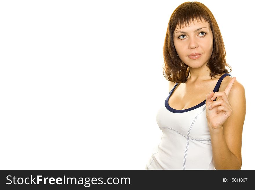 Young girl pointed a finger in the up. Isolated on white background. Young girl pointed a finger in the up. Isolated on white background