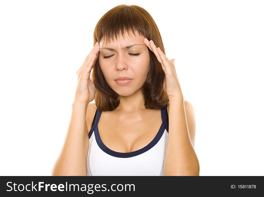 Young girl with a headache on white background