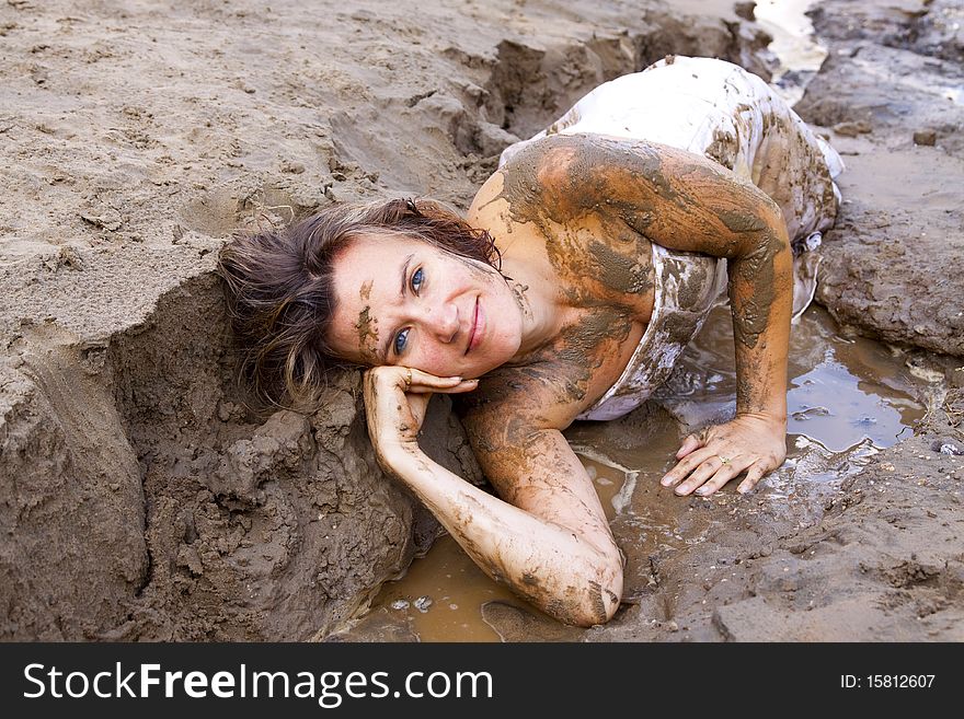 No longer a bride trashing her dress in the mud. She is happy to get it dirty. No longer a bride trashing her dress in the mud. She is happy to get it dirty.