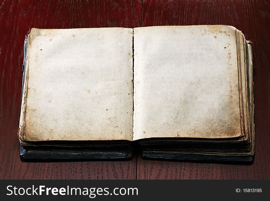 Old book on wooden table. Old book on wooden table