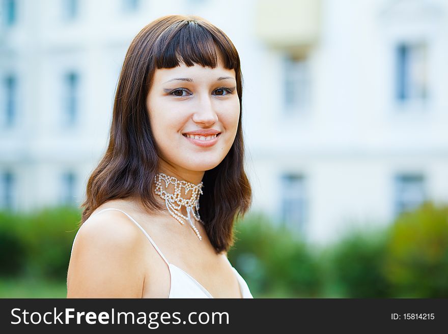 Portrait of naturally beautiful woman in her twenties, shot outside in natural sunlight