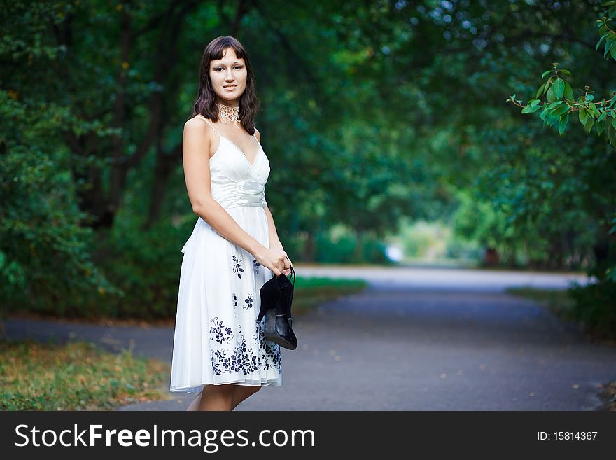 Portrait of naturally beautiful woman in her twenties, shot outside in natural sunlight