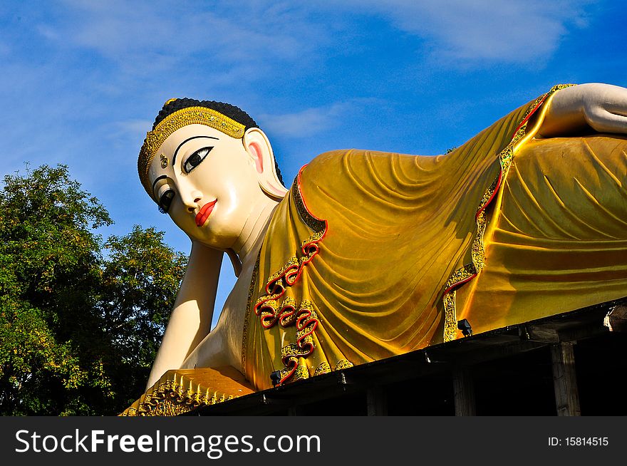 Image of lying Buddha at Wat Phatatsutonmongkonkiri , Phrae Thailand. Image of lying Buddha at Wat Phatatsutonmongkonkiri , Phrae Thailand