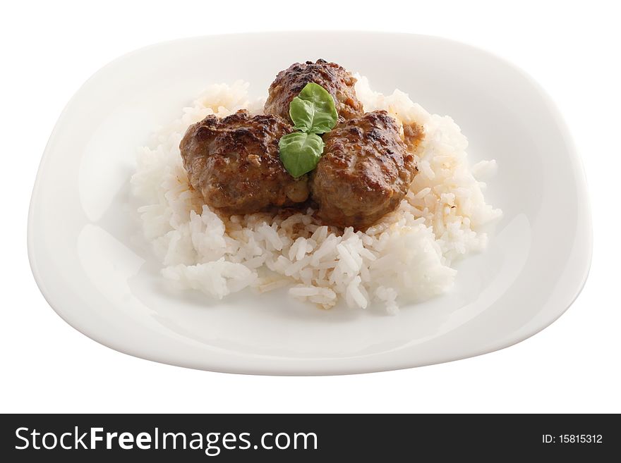 Fried meatballs with boiled rice and basil. Fried meatballs with boiled rice and basil