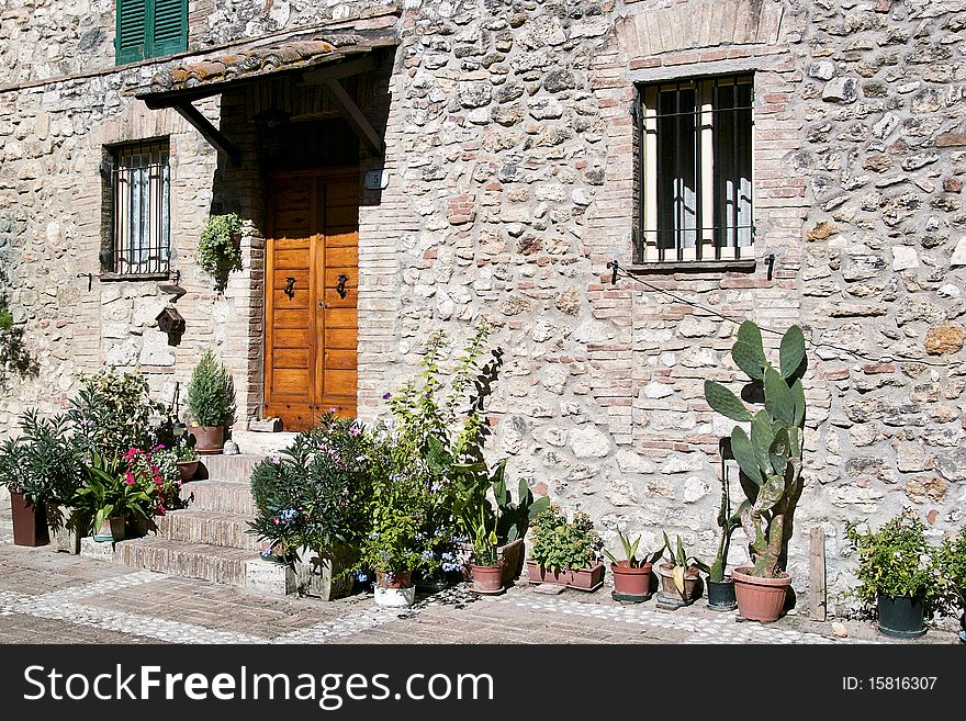 Entrance of an old house in a small hamlet in umbria, Italy