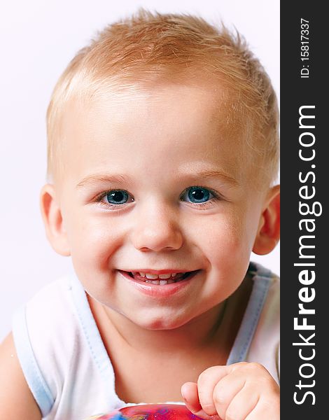 Portrait of happy boy, studio shot