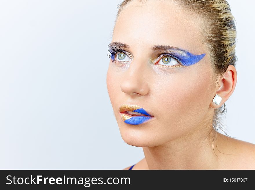Model with art make up on white background. Model with art make up on white background