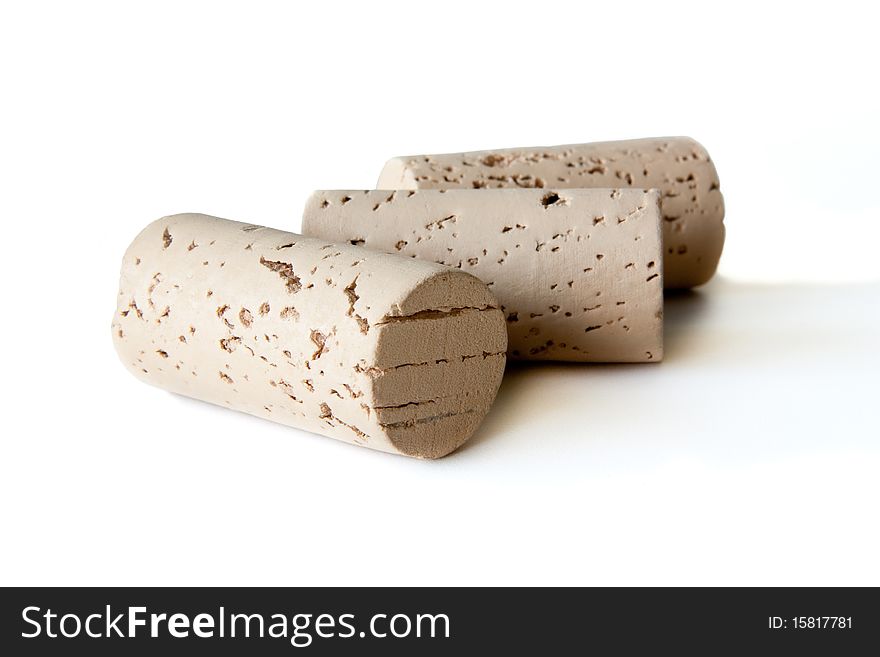 Three wine corks isolated on white background