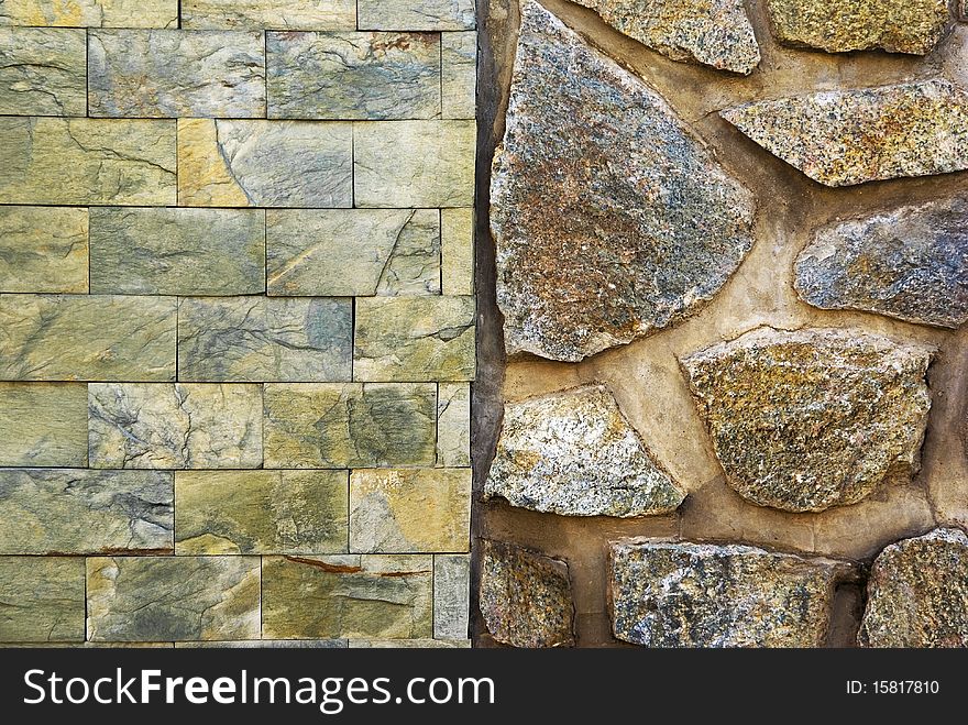 Stone wall. Single shot of house facade with different types of wall texture, bricked and stoned wall pattern. Stone wall. Single shot of house facade with different types of wall texture, bricked and stoned wall pattern.