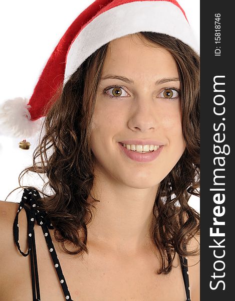 Pretty young woman with santa claus hat, looking at camera. Pretty young woman with santa claus hat, looking at camera