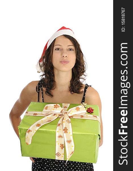 Pretty young woman holding christmas gift and sending kiss. Pretty young woman holding christmas gift and sending kiss