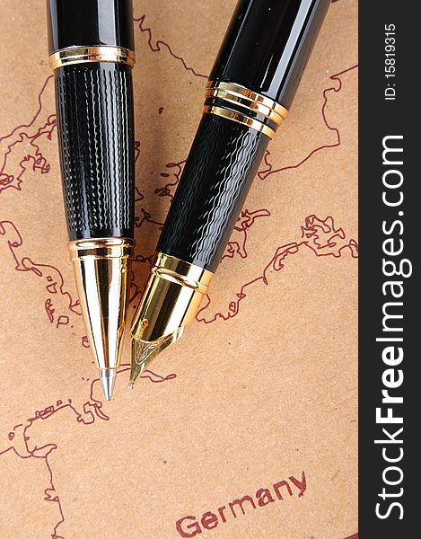 Two pens putting on a European map, means business and travel concept. Two pens putting on a European map, means business and travel concept.