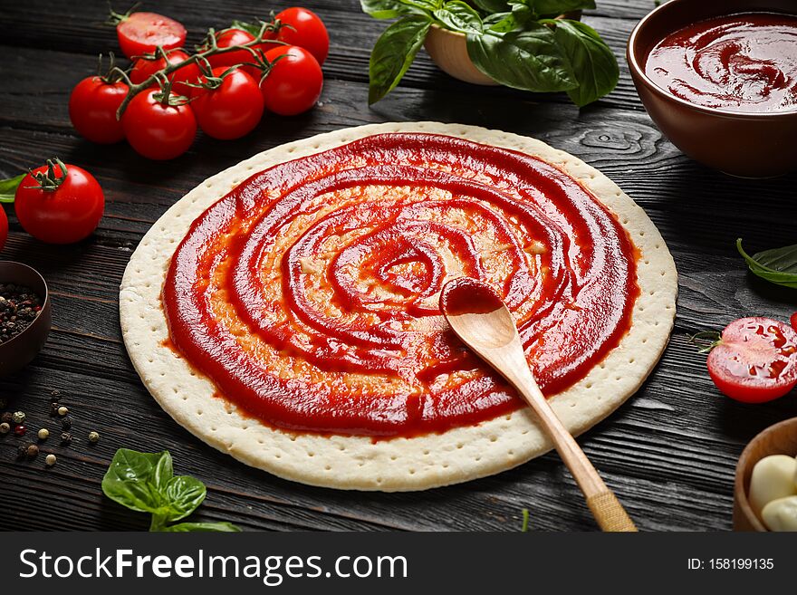 Composition with pizza crust and ingredients
