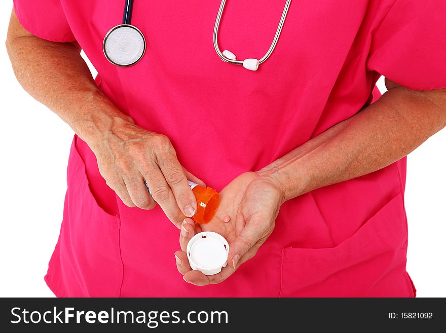 Doctor Dispensing Pills Into Hand