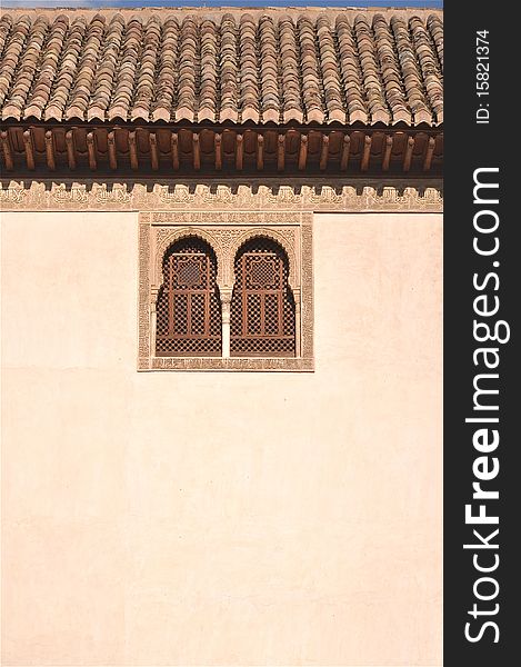 Windows of the Moorish Palace at the Alhambra, a landmark of the Arab culture in Spain. A great place (tower) for vacations. Windows of the Moorish Palace at the Alhambra, a landmark of the Arab culture in Spain. A great place (tower) for vacations.