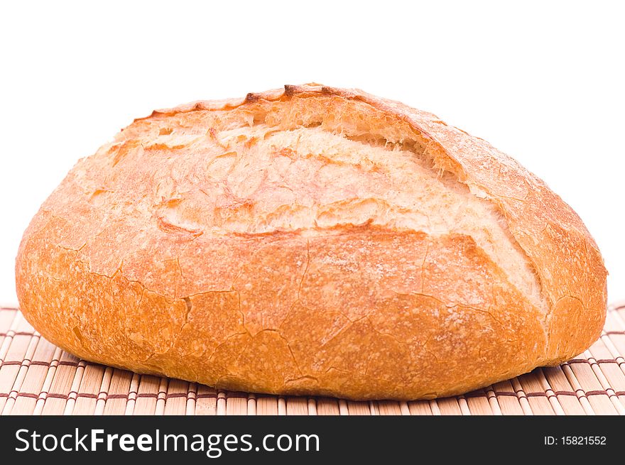 Fresh wheat bread. Isolated on white background