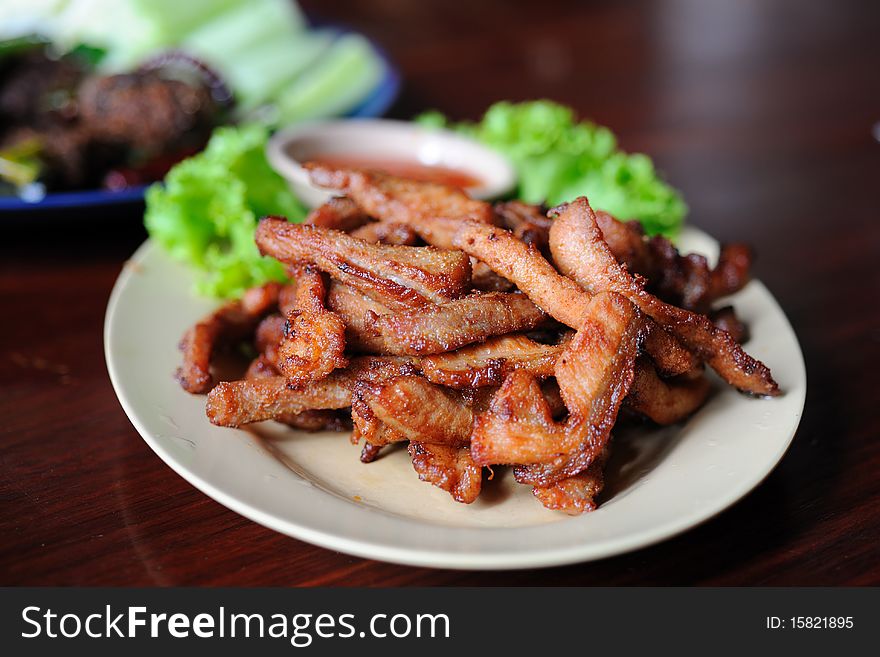 Fried pork on the table.