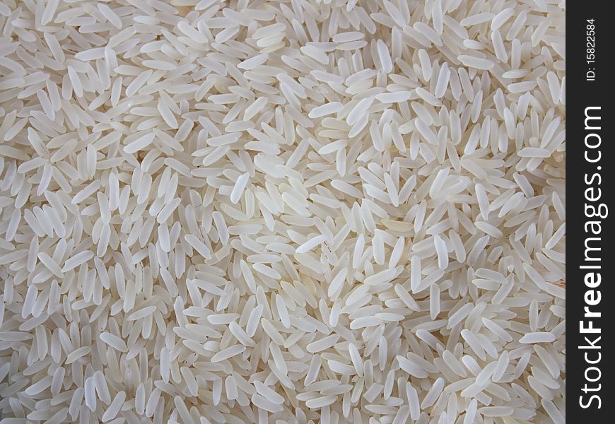 Long white rice meal grain a background