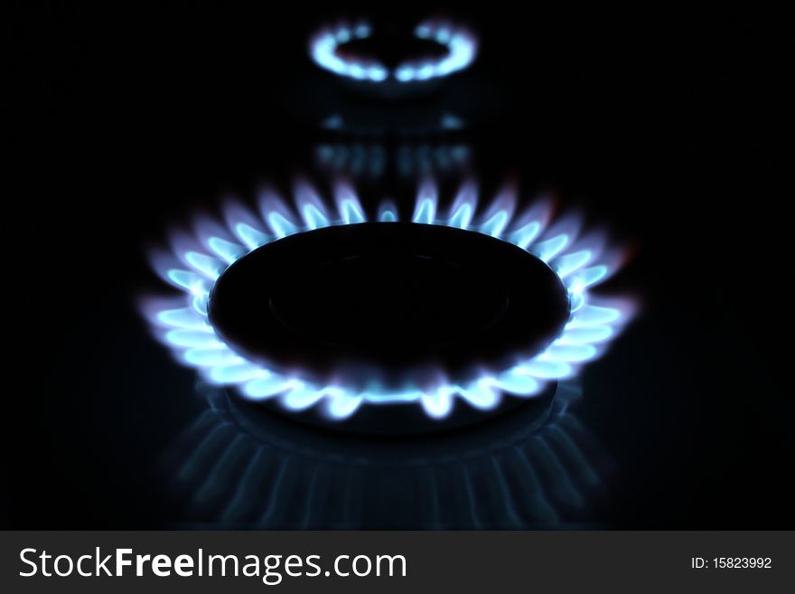 Close up of kitchen gas range with burning. Close up of kitchen gas range with burning..