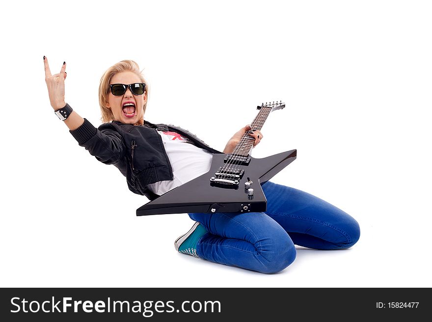 Rock and roll girl playing an electric huitar over white