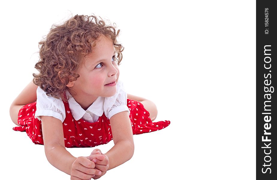 Young Girl Lying On Stomach In Studio an looking to a side